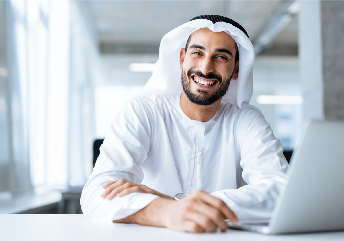 Photo of a man from the UAE on a laptop