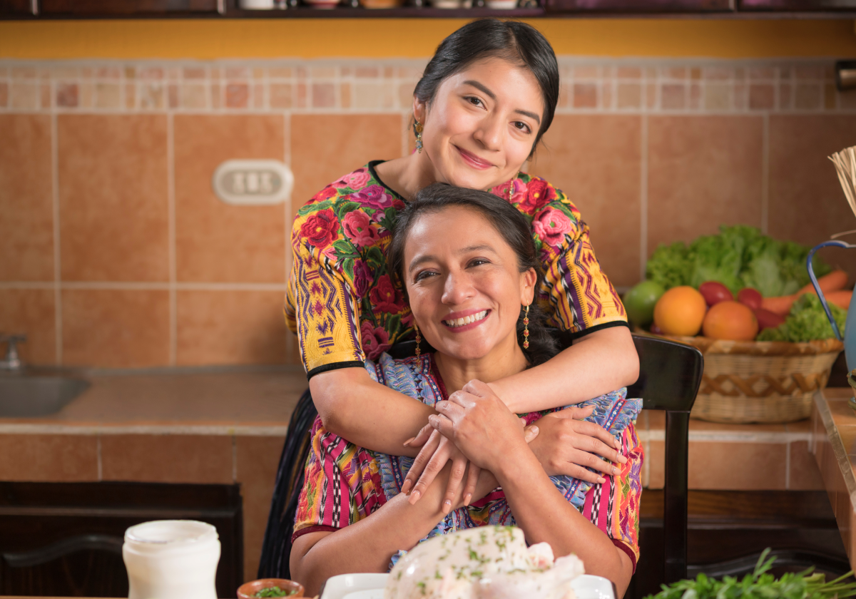 Mother and daughter embracing in Guatemala