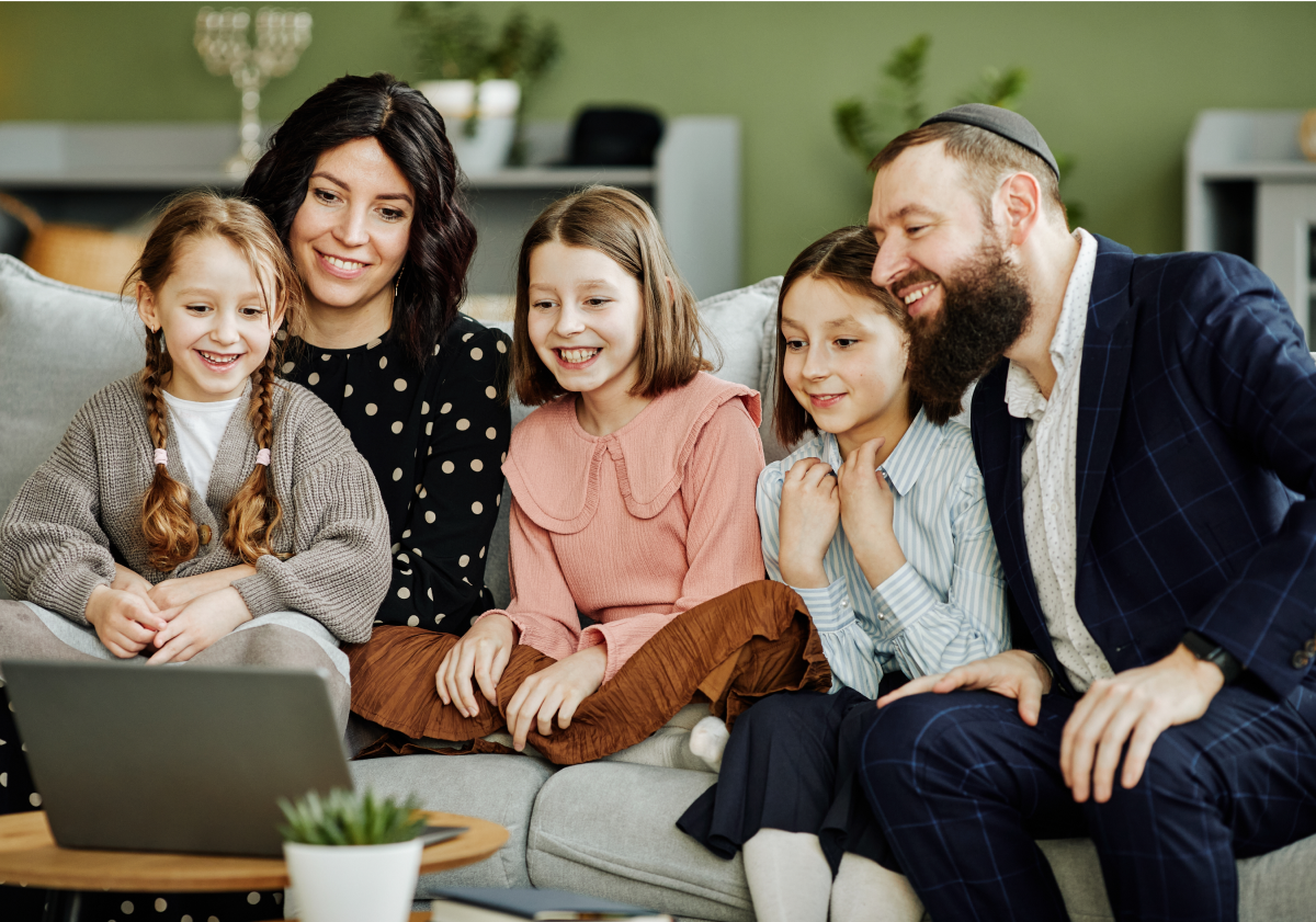 Family in Israel looking at a computer