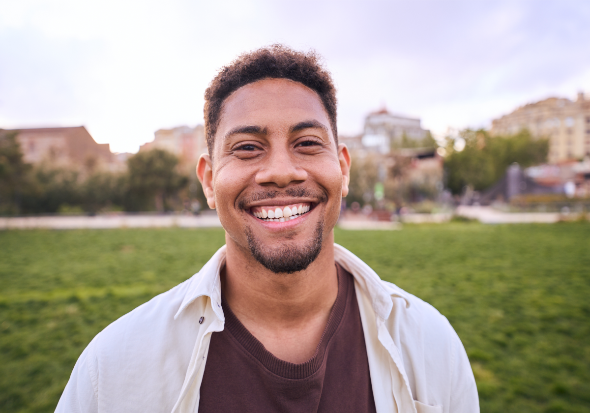 Man smiling in a city in the Cayman Islands