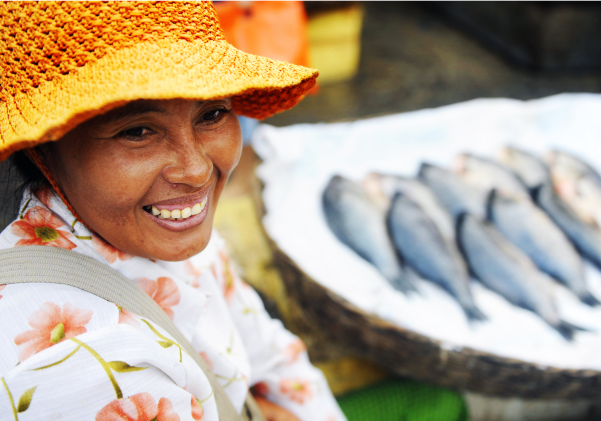 Photo of woman selling fish in Cambodia