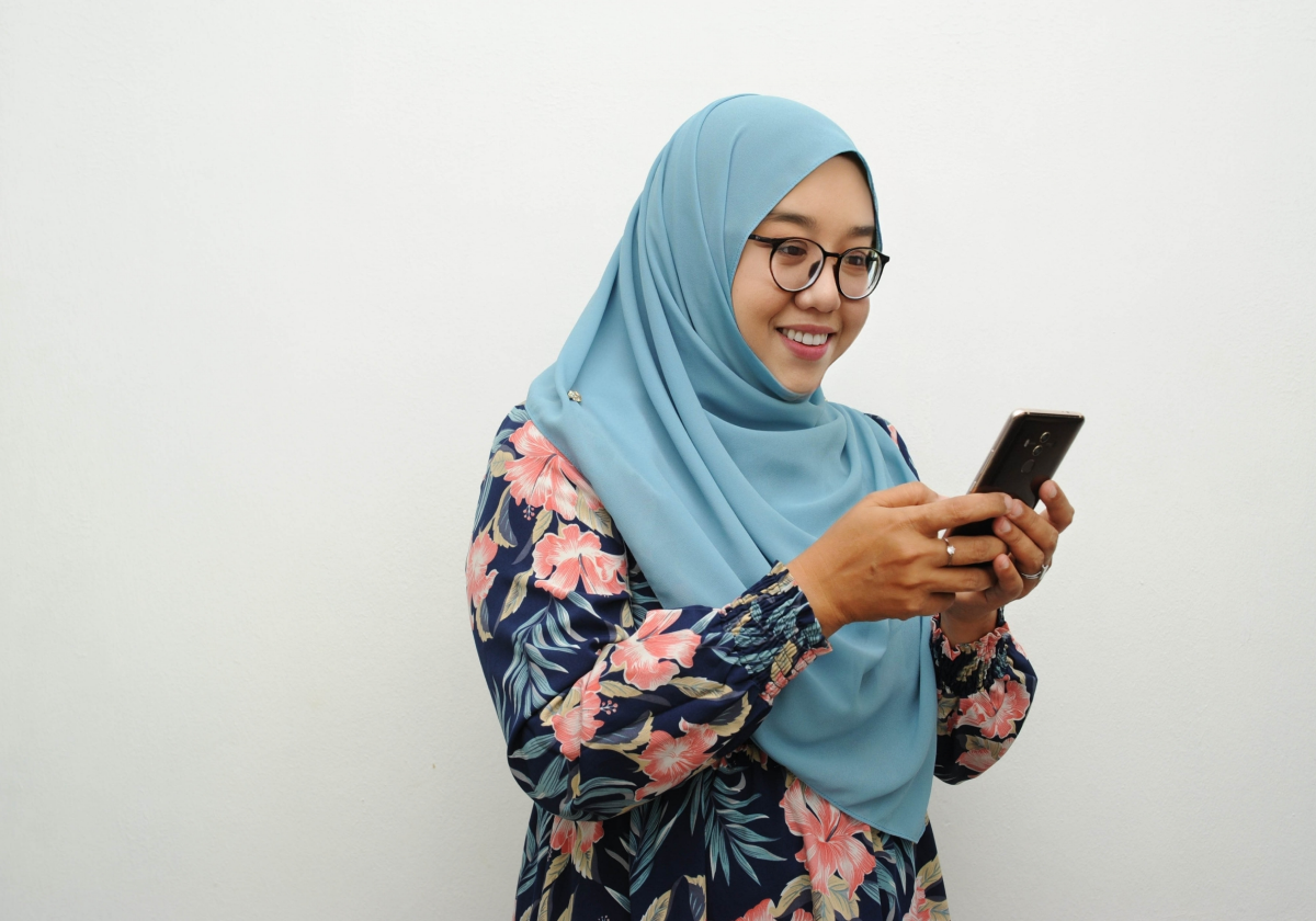 Woman on mobile phone in Brunei